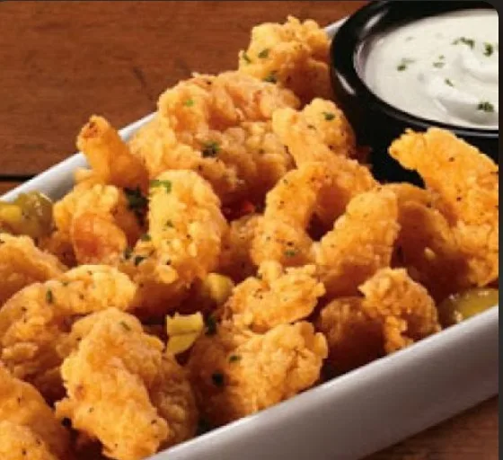 Fried Wild West shrimp with a dipping sauce (illustrative image)
