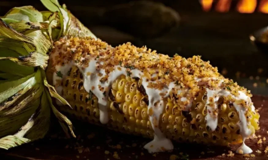 Fire-grilled corn on the cob (illustrative image)