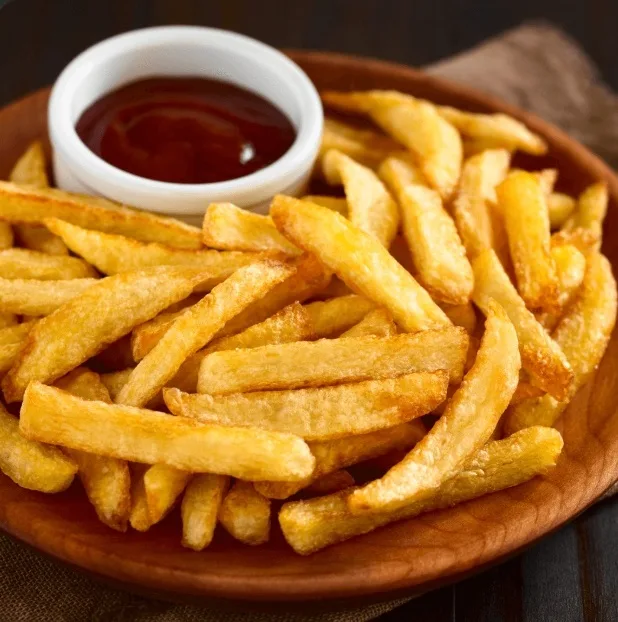Crispy French fries with dipping sauce (illustrative image)